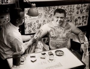 History of Traditional Oldschool Sailor Tattoos . Sailor getting tattooed in Copenhagen.